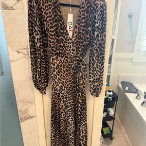 Ganni Animal print wrap dress with flounce sleeves.